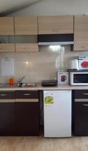 Kuchyň nebo kuchyňský kout v ubytování 3SYS Apartment 401