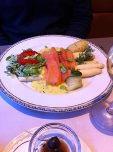 
a plate of food on a table at B&B Verdi in Bruges
