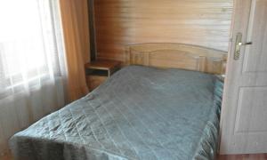 Postel nebo postele na pokoji v ubytování Cottage u Yaremy Mykulychyn