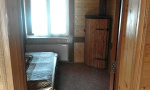 Postel nebo postele na pokoji v ubytování Cottage u Yaremy Mykulychyn
