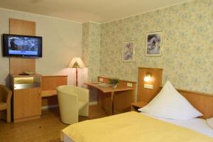 Postel nebo postele na pokoji v ubytování Hotel & Gasthof Garküche + 37 fotografií