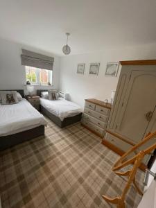 Postel nebo postele na pokoji v ubytování The Bay, Filey, Moonshine Cottage + 71 fotografií