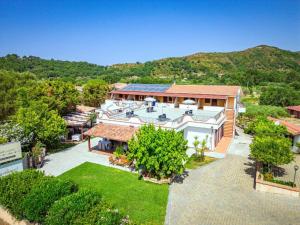 an aerial view of a house with a garden at Hotel Palinuro Cilentiamoci rooms in Palinuro