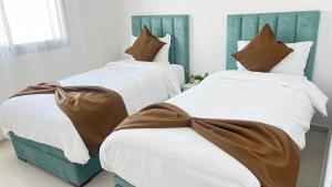 Postel nebo postele na pokoji v ubytování Magnifique Appart familiale, lumineux avec vue mer proche plage surf et bronzette securite 24h sur 24 + 25 fotografií