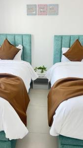 Postel nebo postele na pokoji v ubytování Magnifique Appart familiale, lumineux avec vue mer proche plage surf et bronzette securite 24h sur 24 + 25 fotografií