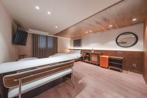 Gyeongju Coolstay hotel客房内的一张或多张床位