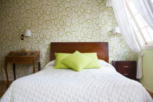 Postel nebo postele na pokoji v ubytování Hotel Iris La Eliana