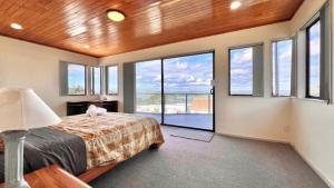 Ένα ή περισσότερα κρεβάτια σε δωμάτιο στο Tranquil Haven Retreat