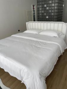Letto o letti in una camera di Tonglu HECHU Laf