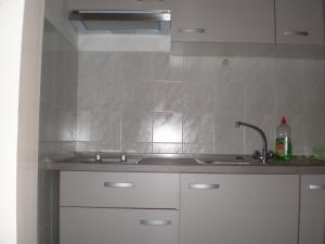 Kuchyňa alebo kuchynka v ubytovaní Tivoli Apartment