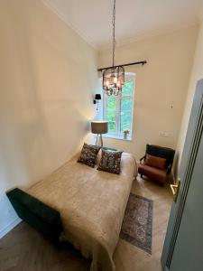 Postel nebo postele na pokoji v ubytování Apartament Frombork Łempicka