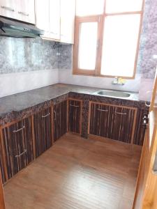 Kuchyň nebo kuchyňský kout v ubytování The Nest#9