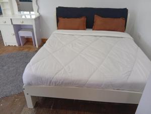 Le Tai Village Homestay客房内的一张或多张床位