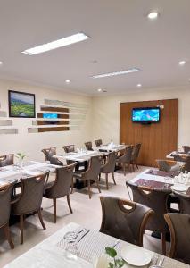 TV a/nebo společenská místnost v ubytování Hotel Sabari Park