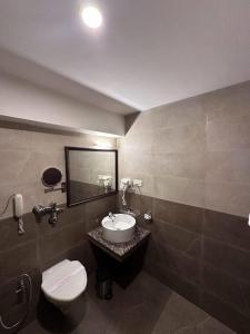 Koupelna v ubytování Hotel Sabari Park