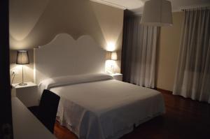 Posteľ alebo postele v izbe v ubytovaní Hotel Chancelas