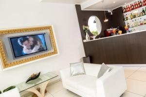 TV a/nebo společenská místnost v ubytování Hotel & Aparthotel Carinthia S