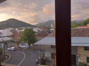 a view from a window of a town with a street at Orkide in Sheki