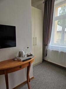 Μια τηλεόραση ή/και κέντρο ψυχαγωγίας στο Apartmány Aurelius