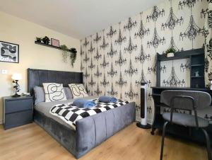 Et opholdsområde på Stylish 4-Bed, 3-Bath Townhouse with Free Parking