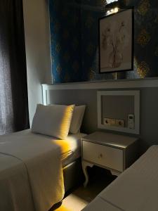 Postel nebo postele na pokoji v ubytování Safir Hotels Çorlu