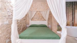 Ένα ή περισσότερα κρεβάτια σε δωμάτιο στο Princess Suites 1-2 by Rentbeat
