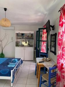 Kuchyň nebo kuchyňský kout v ubytování Stamatis Rooms