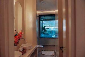 Ein Badezimmer in der Unterkunft Rea Boutique Hotel