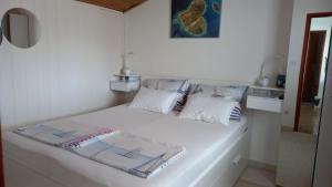 Postel nebo postele na pokoji v ubytování Felix Apartment Biograd