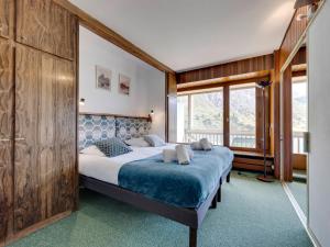 Posteľ alebo postele v izbe v ubytovaní T2 lumineux à Tignes, balcon sud, 4-5 personnes - FR-1-641-71