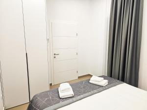 Posteľ alebo postele v izbe v ubytovaní Marina Baotić Apartments