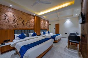 Μια τηλεόραση ή/και κέντρο ψυχαγωγίας στο Hotel Shree Radhe