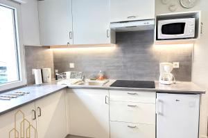 Η κουζίνα ή μικρή κουζίνα στο Le Ferdinand II - Chic & Central