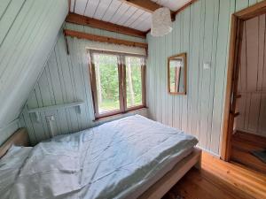 Ảnh trong thư viện ảnh của Klimatyczna chatka z widokiem na jezioro ở Woryty +8 ảnh