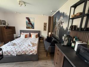 Ένα ή περισσότερα κρεβάτια σε δωμάτιο στο Luxury Studio2 in Hotel Friends Spa