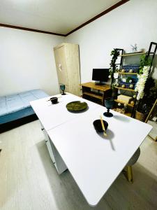 Μια τηλεόραση ή/και κέντρο ψυχαγωγίας στο Gwangalli Cosy Beach Home
