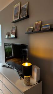 Et tv og/eller underholdning på Apartament Bajka