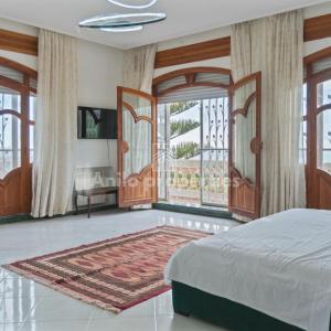 Ένα ή περισσότερα κρεβάτια σε δωμάτιο στο Villa élégante avec piscine privée