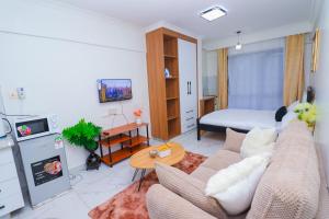 Μια τηλεόραση ή/και κέντρο ψυχαγωγίας στο Smart Homes Apartment