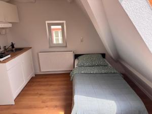 Kuchyň nebo kuchyňský kout v ubytování Traumhaft moderne Einzelzimmer Gemeinschaftsbad- WC + 11 fotografií
