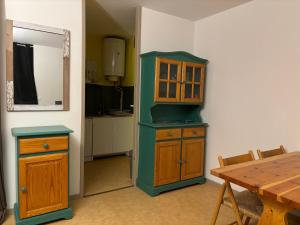 Kuchyň nebo kuchyňský kout v ubytování Les Vacances de Nalian Appartement au pied des pistes