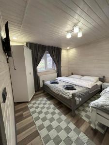 Postel nebo postele na pokoji v ubytování Мелодія Гір