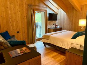 Voodi või voodid majutusasutuse Hotel Pedranzini toas