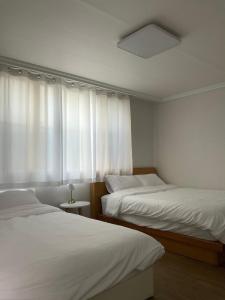 Postel nebo postele na pokoji v ubytování Soo House