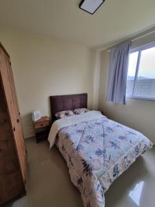 Postel nebo postele na pokoji v ubytování Apartamento Araucária