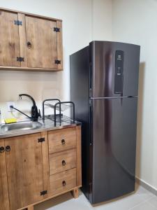 Kuchyň nebo kuchyňský kout v ubytování Apartamento Araucária