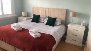 Ένα ή περισσότερα κρεβάτια σε δωμάτιο στο Netherby Guest House Edinburgh