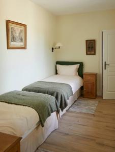 Postel nebo postele na pokoji v ubytování La Maison d'Irene