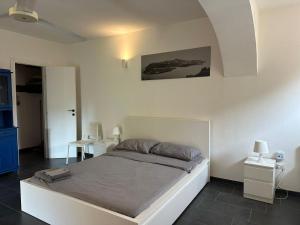 A bed or beds in a room at Casa Luvi