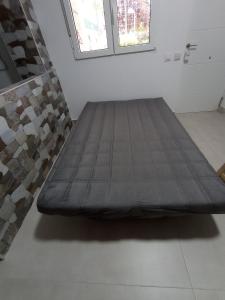 Ένα ή περισσότερα κρεβάτια σε δωμάτιο στο Estudio Madrid L9C